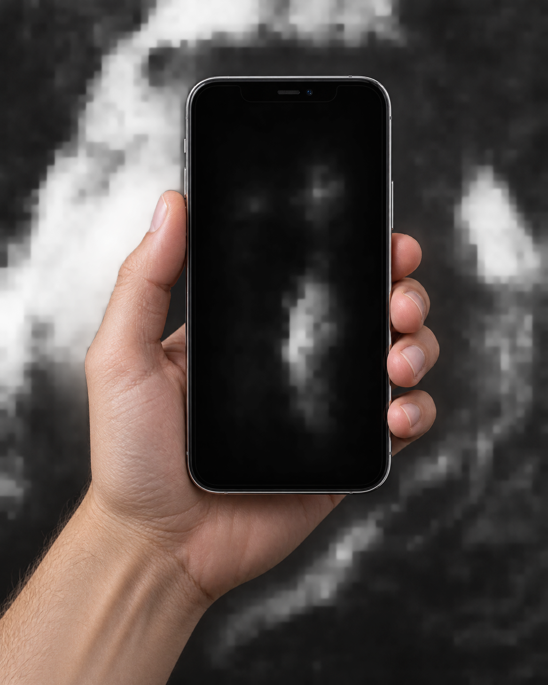 A hand holding an iPhone